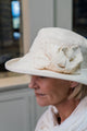 Ladies Wide Brim Cotton Hat Finished with Cream Linen Knot