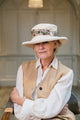 Stylish Cream Cotton Wide Brim Hat with Floral Band Finished a Wooden Buckle Ring.