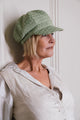 Ladies Green Baker Boy Cap, Trimmed with a Hand Painted Floral Pottery Button