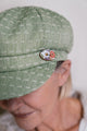 Ladies Green Baker Boy Cap, Trimmed with a Hand Painted Floral Pottery Button