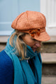 Coral Textured Baker Boy Cap trimmed with a Velvet Bow