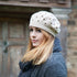 Stylish Knitted Beret with Embellished Holes